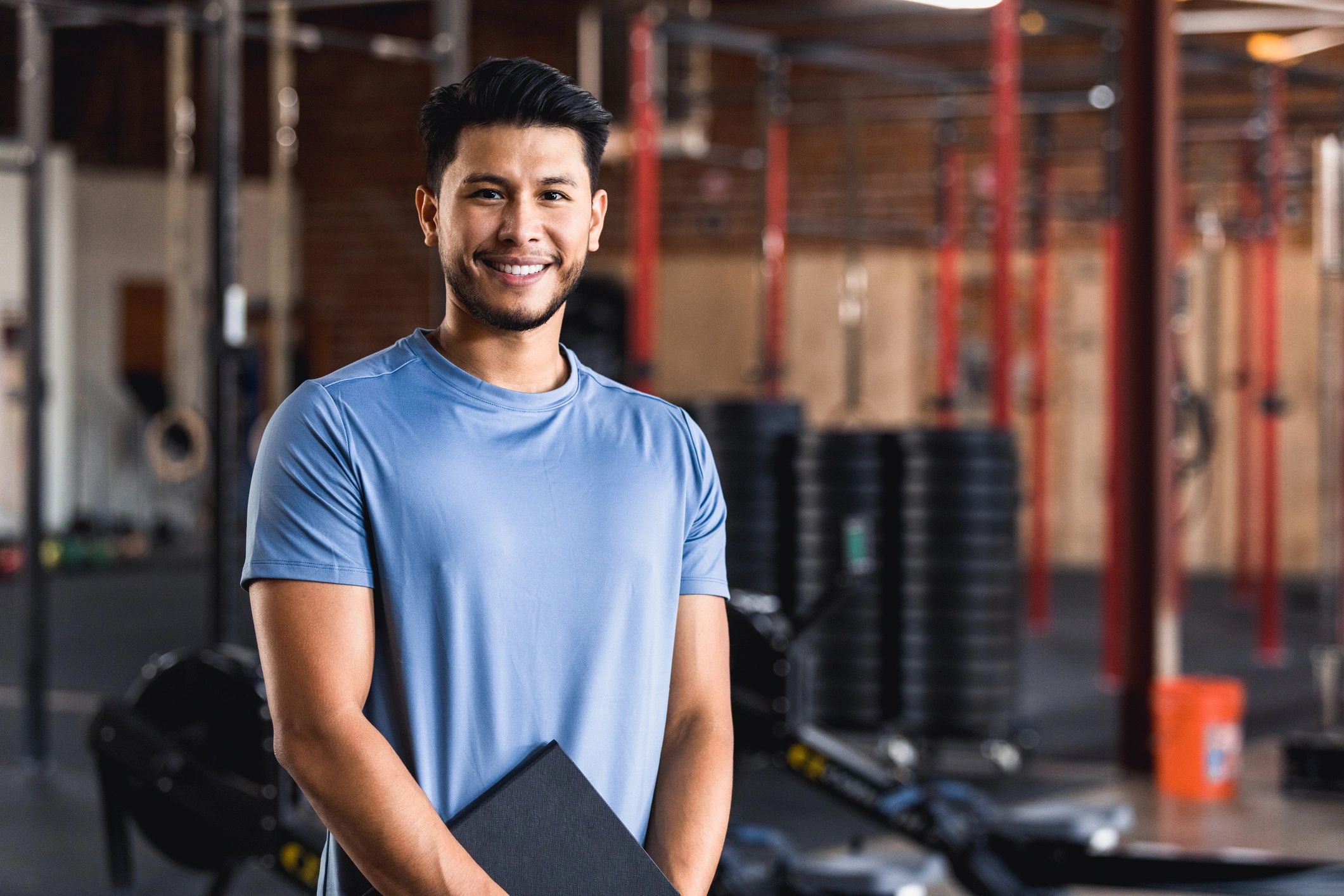 Personal trainer ready to discuss coaching options