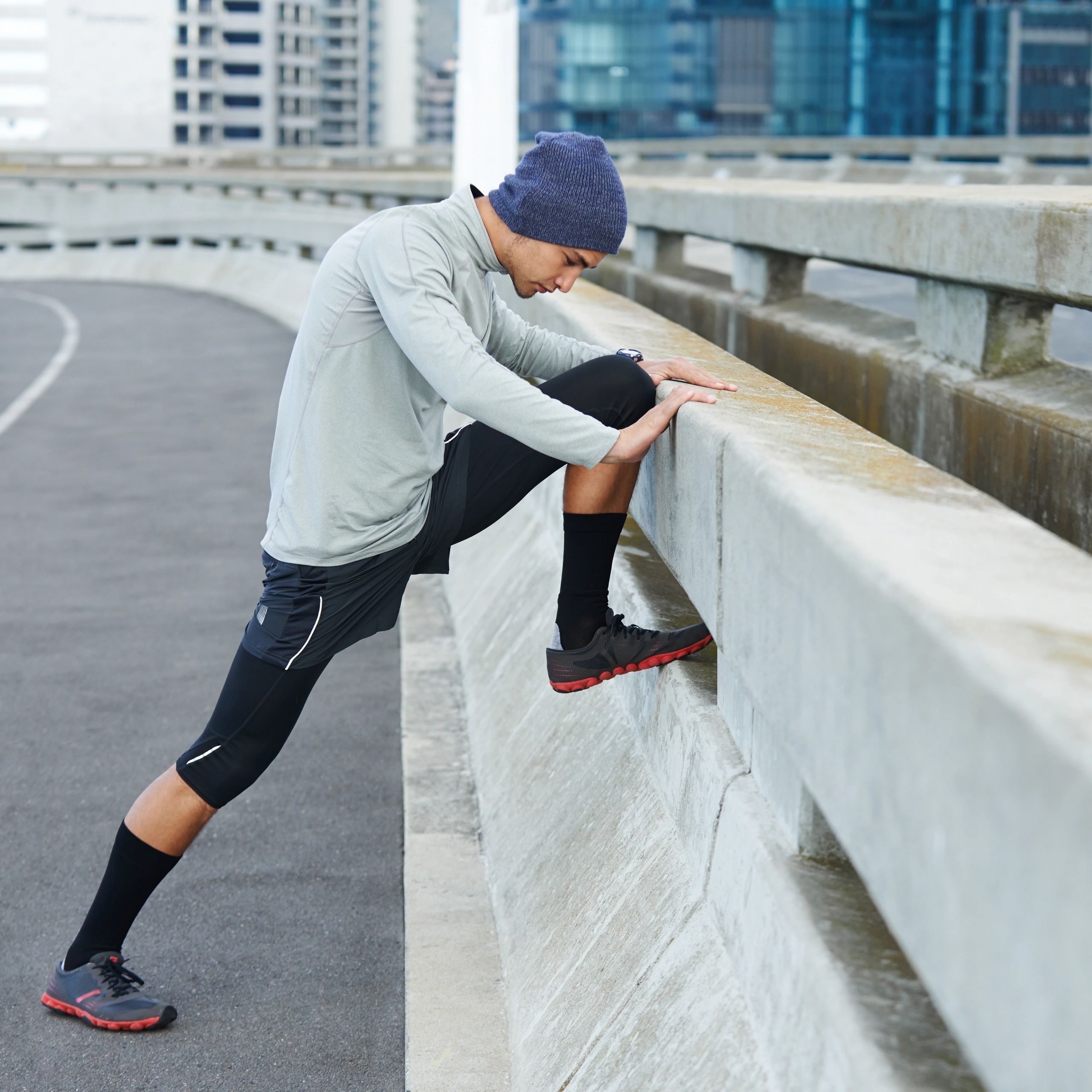 Man stretching outdoors before a run